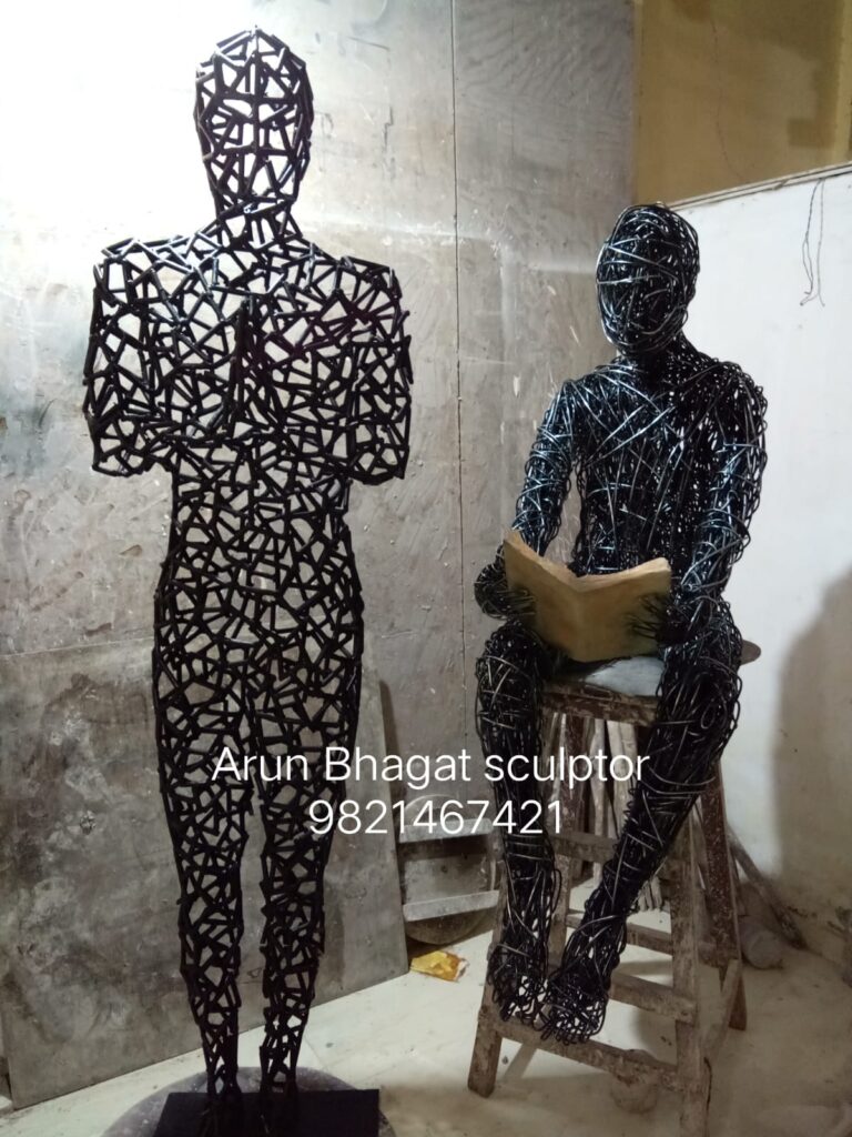 Metal Sculpture of two men-Standing and Sitting